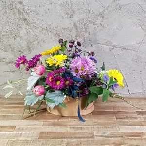 Bombonera con margarita y gerbera