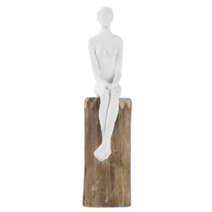 Figura señora sentada